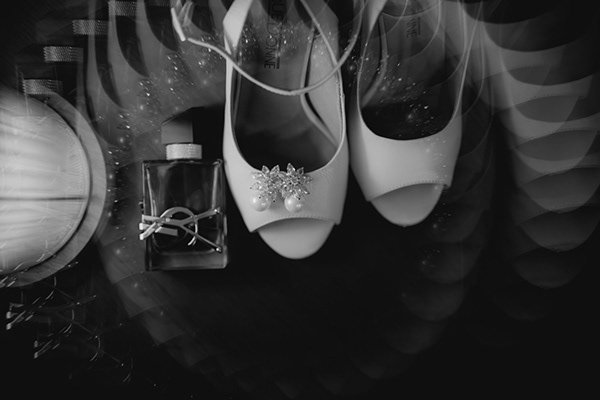 Bridal shoes photographed in black and white